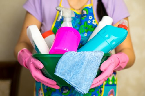 Service note and cleaning equipment beside an oven