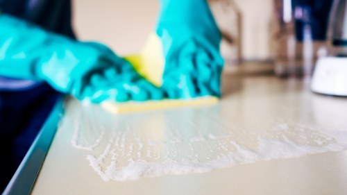 Local cleaners working in a busy Ilford property